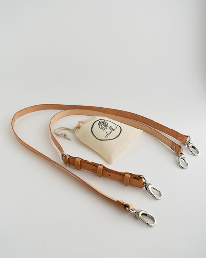 Tracolla per borsa in vera pelle a concia vegetale.
