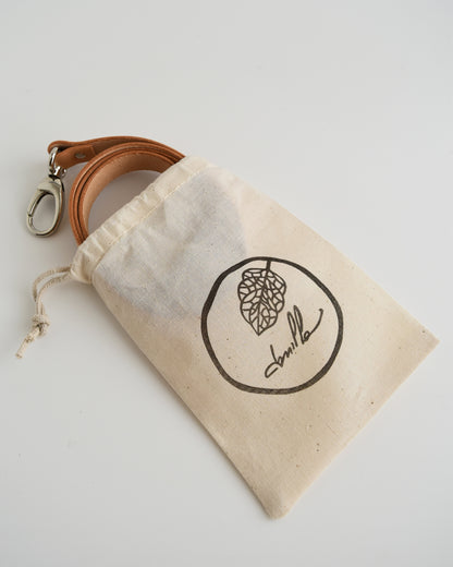 Tracolla per borsa in vera pelle a concia vegetale.