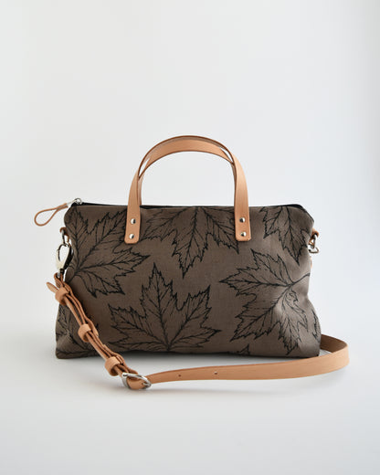 Borsa bauletto CANNELLA tessuto fango stampa acero