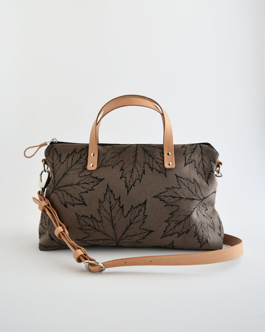 Borsa bauletto CANNELLA tessuto fango stampa acero