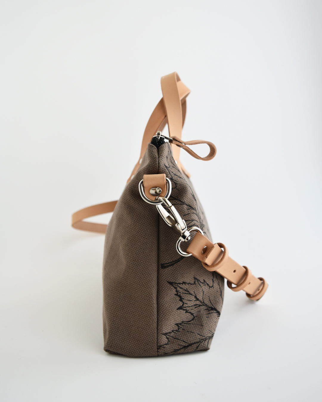 Borsa bauletto CANNELLA tessuto fango stampa acero