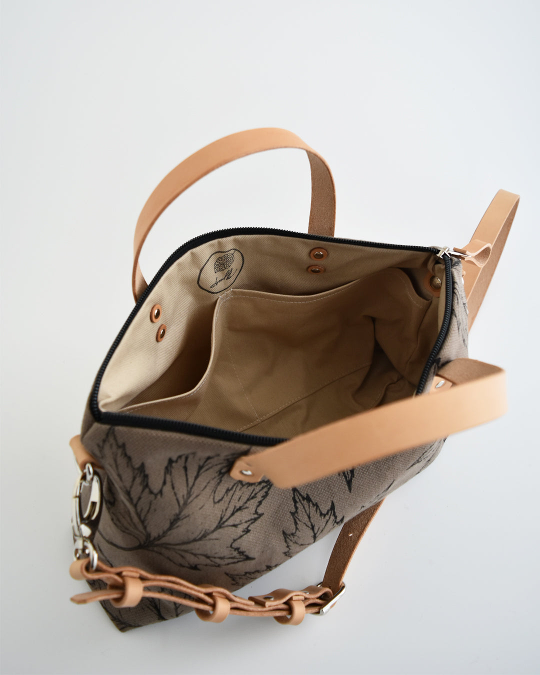 Borsa bauletto CANNELLA tessuto fango stampa acero